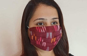 maroon tri-color ikat double layer face mask hand sewn in India by the artisans at Sewing New Futures. 