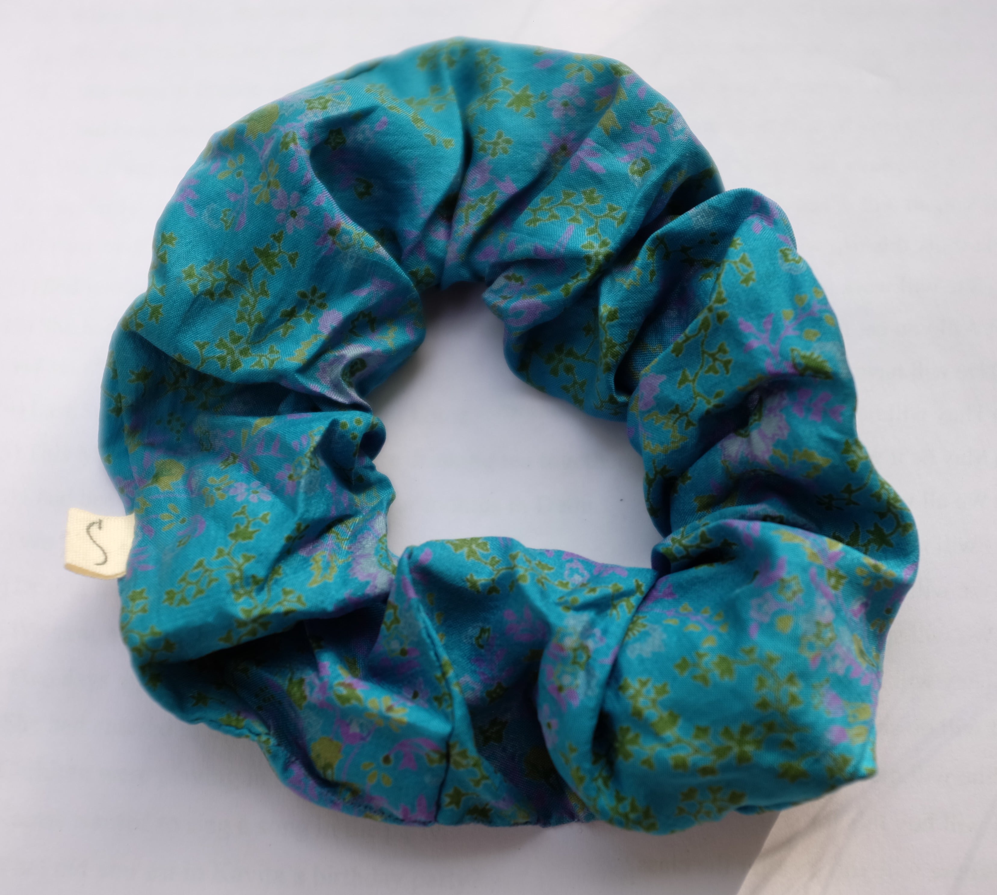 blue scrunchie made from recycled sari fabric